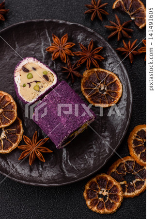 Turkish delight or lokum is a traditional Eastern sweet made with nuts. Turkish delight, lokum Turkish delight or lokum is a traditional Eastern sweet made with nuts. Turkish delight, lokum 141491605