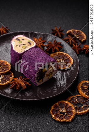 Turkish delight or lokum is a traditional Eastern sweet made with nuts. Turkish delight, lokum Turkish delight or lokum is a traditional Eastern sweet made with nuts. Turkish delight, lokum 141491606