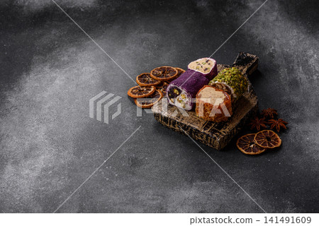 Turkish delight or lokum is a traditional Eastern sweet made with nuts. Turkish delight, lokum Turkish delight or lokum is a traditional Eastern sweet made with nuts. Turkish delight, lokum 141491609