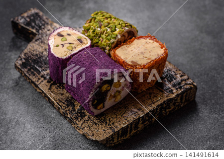 Turkish delight or lokum is a traditional Eastern sweet made with nuts. Turkish delight, lokum Turkish delight or lokum is a traditional Eastern sweet made with nuts. Turkish delight, lokum 141491614