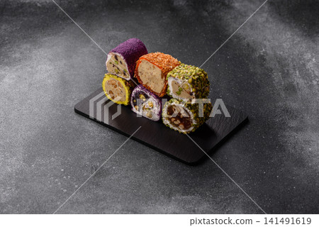 Turkish delight or lokum is a traditional Eastern sweet made with nuts. Turkish delight, lokum Turkish delight or lokum is a traditional Eastern sweet made with nuts. Turkish delight, lokum 141491619