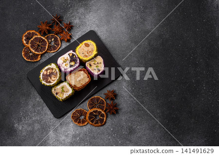 Turkish delight or lokum is a traditional Eastern sweet made with nuts. Turkish delight, lokum Turkish delight or lokum is a traditional Eastern sweet made with nuts. Turkish delight, lokum 141491629