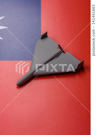 A Shahed drone featuring a prohibition symbol on the taiwanese flag as a conceptual background 141491665