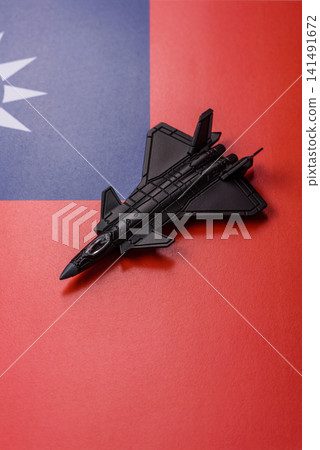 A fighter jet against the taiwanese flag as a conceptual background representing defense A fighter jet against the taiwanese flag as a conceptual background representing defense 141491672