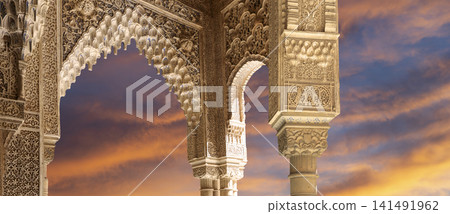 Arches in Islamic (Moorish) style (against the sunset) in Alhambra, Granada, Spain Arches in Islamic (Moorish) style (against the sunset) in Alhambra, Granada, Spain 141491962