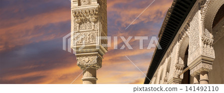 Arches in Islamic (Moorish) style (against the sunset) in Alhambra, Granada, Spain Arches in Islamic (Moorish) style (against the sunset) in Alhambra, Granada, Spain 141492110