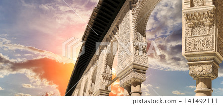 Arches in Islamic (Moorish) style (against the sunset) in Alhambra, Granada, Spain Arches in Islamic (Moorish) style (against the sunset) in Alhambra, Granada, Spain 141492111