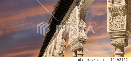 Arches in Islamic (Moorish) style (against the sunset) in Alhambra, Granada, Spain Arches in Islamic (Moorish) style (against the sunset) in Alhambra, Granada, Spain 141492112