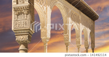 Arches in Islamic (Moorish) style (against the sunset) in Alhambra, Granada, Spain 141492114