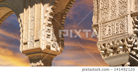 Arches in Islamic (Moorish) style (against the sunset) in Alhambra, Granada, Spain Arches in Islamic (Moorish) style (against the sunset) in Alhambra, Granada, Spain 141492120