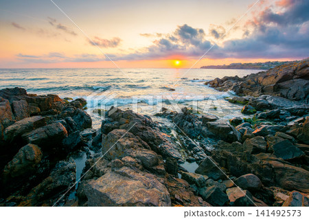 sea landscape at sunrise. rocky coast of bulgaria in summer. dramatic travel background with epic sky 141492573