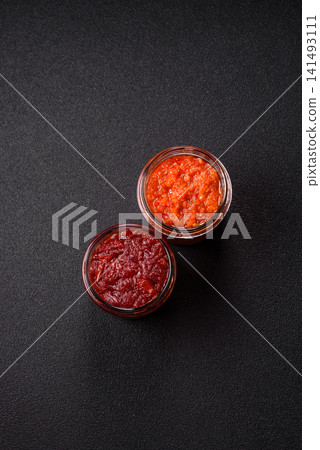 Grated beetroot with salt and spices as an ingredient for borscht or a vegan salad. Grated beetroot Grated beetroot with salt and spices as an ingredient for borscht or a vegan salad. Grated beetroot 141493111