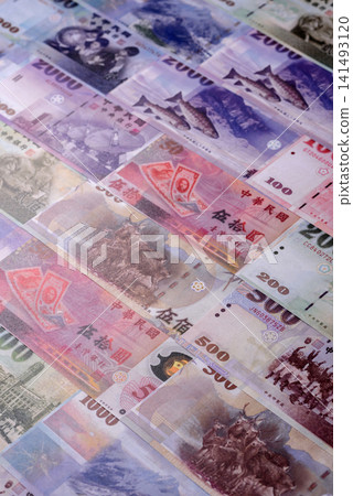 Taiwan, Taiwanese paper banknotes and coins, dollars of various denominations. Taiwanese dollars Taiwan, Taiwanese paper banknotes and coins, dollars of various denominations. Taiwanese dollars 141493120