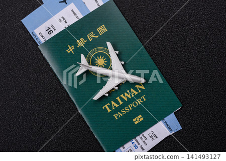 Taiwan, Taiwanese passport or id document with tickets for flight, travel. Taiwanese passport 141493127
