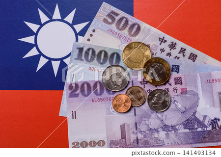 Taiwan, Taiwanese paper banknotes and coins, dollars of various denominations. Taiwanese dollars Taiwan, Taiwanese paper banknotes and coins, dollars of various denominations. Taiwanese dollars 141493134