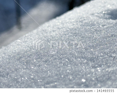 Snow surface gleaming during a cold winter day Snow surface gleaming during a cold winter day 141493555