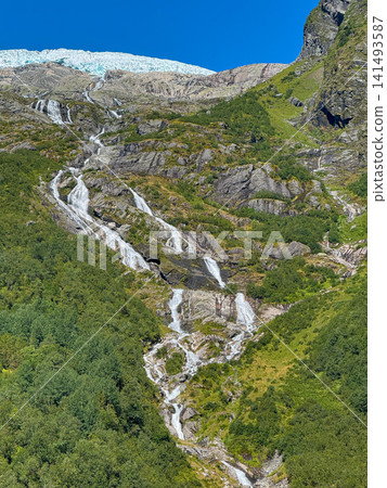 Waterfalls flowing from boyabreen glacier in norway Waterfalls flowing from boyabreen glacier in norway 141493587