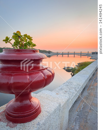 Red vase on promenade in Vila Praia de Ancora Red vase on promenade in Vila Praia de Ancora 141494245
