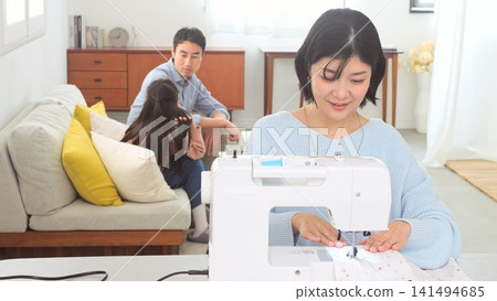 Sewing machine woman image Sewing machine woman image 141494685