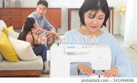 Sewing machine woman image Sewing machine woman image 141494696