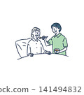 Female staff assist elderly women with meals. 141494832