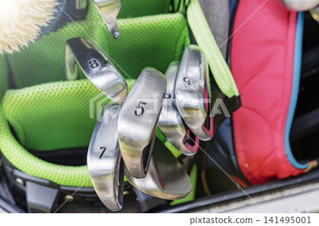 Golf clubs stored in a golf bag Golf clubs stored in a golf bag 141495001