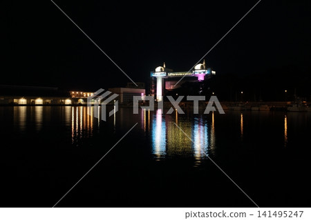 Illuminated night view of the harbor Illuminated night view of the harbor 141495247