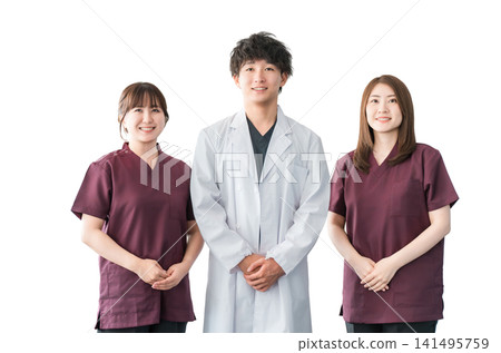 Doctors, nurses and other male and female staff wearing white coats and scrubs Doctors, nurses and other male and female staff wearing white coats and scrubs 141495759