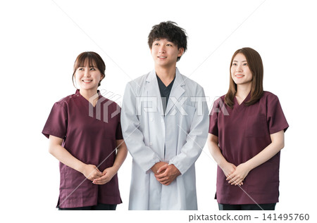 Doctors, nurses and other male and female staff wearing white coats and scrubs 141495760