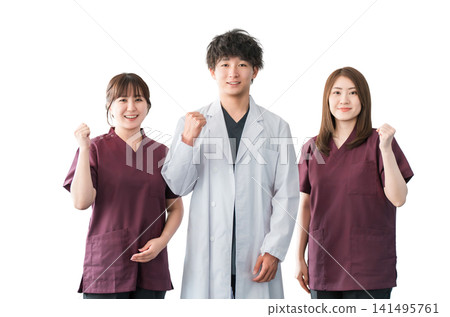 Doctors, nurses and other male and female staff wearing white coats and scrubs Doctors, nurses and other male and female staff wearing white coats and scrubs 141495761