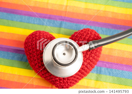 LGBT symbol, Stethoscope with red heart on rainbow flag, rights and gender equality, LGBT Pride Month in June. LGBT symbol, Stethoscope with red heart on rainbow flag, rights and gender equality, LGBT Pride Month in June. 141495793