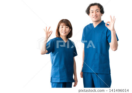 Medical workers in scrubs, medical staff, male and female doctors Medical workers in scrubs, medical staff, male and female doctors 141496014