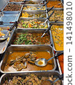 Many menu of Thai food on the stainless trays ready for sale in the morning market in Thailand 141498010