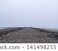 land covered in fog 141498255