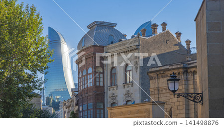 Icherisheher street with street lantern against shining Flame Tower with copy space Icherisheher street with street lantern against shining Flame Tower with copy space 141498876