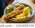 Fish and chips, a traditional British dish. 141499530