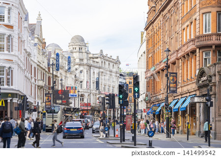 Street scenes in central London and theaters such as the Apollo Theater. Street scenes in central London and theaters such as the Apollo Theater. 141499542