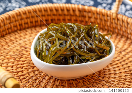 shredded kelp seaweed salad seasoned with sesame oil and vinegar shredded kelp seaweed salad seasoned with sesame oil and vinegar 141500123