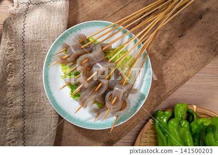 chilled konjac jelly slices mixed with fresh celery and chili chilled konjac jelly slices mixed with fresh celery and chili 141500203
