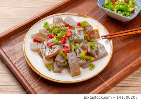 chilled konjac jelly slices seasoned with spicy chili and peppers chilled konjac jelly slices seasoned with spicy chili and peppers 141500205
