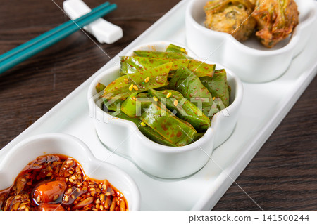 spicy undaria seaweed salad cut stems seasoned with chili oil spicy undaria seaweed salad cut stems seasoned with chili oil 141500244