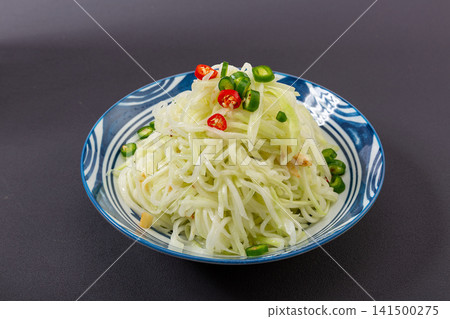 chilled shredded kohlrabi salad finely cut with pepper dressing chilled shredded kohlrabi salad finely cut with pepper dressing 141500275