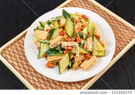 chilled cucumber salad mixed with yuba tofu skin and peanuts chilled cucumber salad mixed with yuba tofu skin and peanuts 141500374