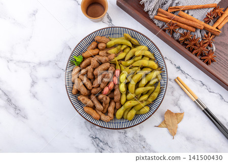 spiced boiled edamame pods and peanuts in shell assortment spiced boiled edamame pods and peanuts in shell assortment 141500430