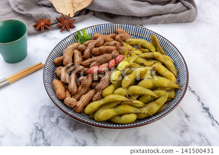 spiced boiled edamame pods and peanuts in shell assortment spiced boiled edamame pods and peanuts in shell assortment 141500431
