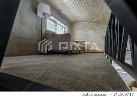 Mezzanine Floor Interior with Sofa and Floor Lamp 141500717