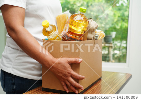 Foodstuffs in donation box for volunteer to help people. 141500809