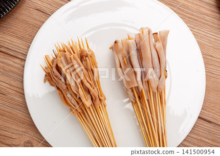 raw Squid Skewers Seafood Ingredient for Asian Cuisine raw Squid Skewers Seafood Ingredient for Asian Cuisine 141500954