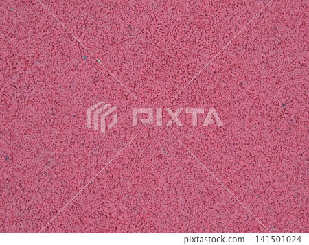 A seamless rubber surface of a rich pink-red color. The surface consists of finely pressed crumbs and has a porous, rough texture. This type of rubber crumb is used on sports grounds. A seamless rubber surface of a rich pink-red color. The surface consists of finely pressed crumbs and has a porous, rough texture. This type of rubber crumb is used on sports grounds. 141501024