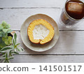 Roll cake and iced coffee 141501517